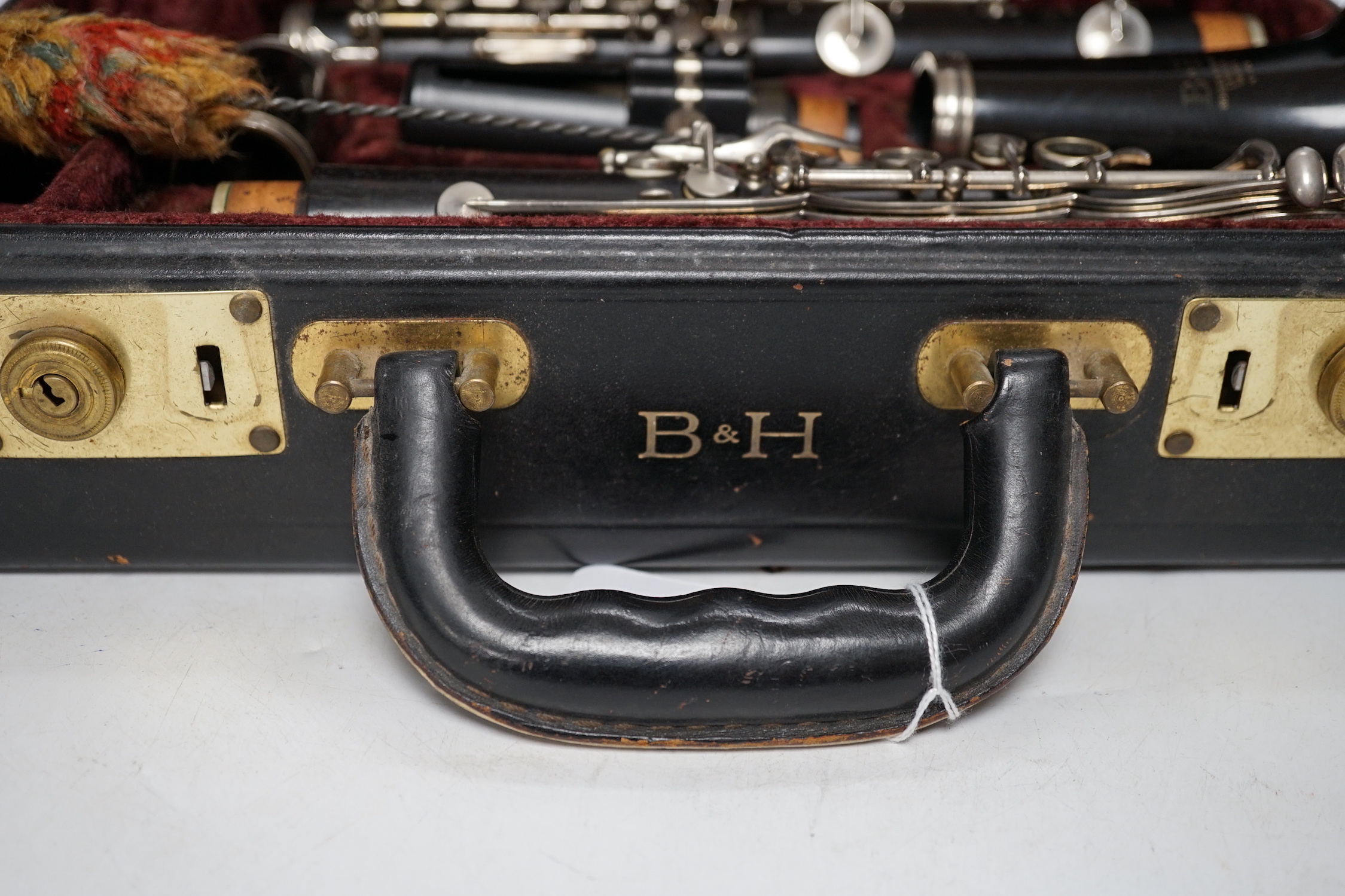 A cased Boosey & Hawkes 4-20 clarinet, in a fine original fitted leather case